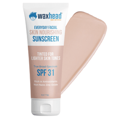 Waxhead Mineral Tinted Sunscreen for Face in a tube with a light tint for lighter skin tones and SPF 31 protection.