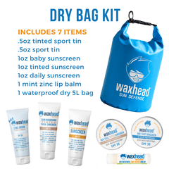Waxhead dry bag kit with sunscreen and lip balm on a white background