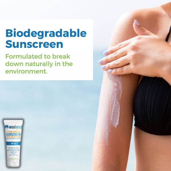 Zinc Oxide Sunscreen - Vitamin Enriched applied on skin with Biodegradable Sunscreen packaging in background.