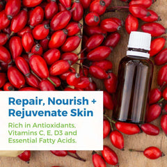 Organic Rosehip Seed Oil Serum with CoQ10 surrounded by rose hip berries, promoting skin repair and nourishment.