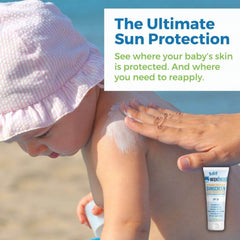 Baby Mineral Sunscreen Zinc Oxide being applied to a baby's skin for ultimate sun protection at the beach.