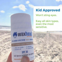 Tinted Zinc Sunscreen Stick for Face with SPF 30, kid approved, water-resistant, suitable for sensitive skin.