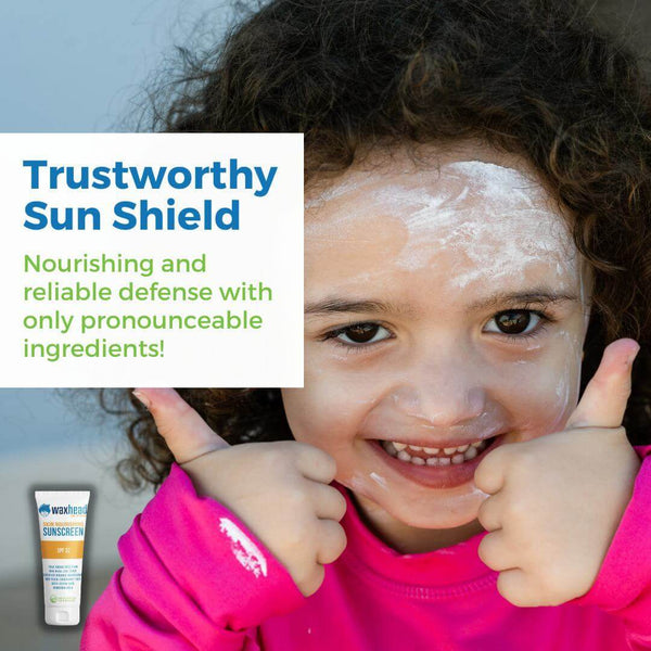 Mineral Zinc Oxide Sunscreen applied on child's face with thumbs up, showcasing safe sun protection.