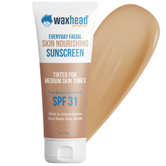 Waxhead Mineral Tinted Sunscreen for Face in a tube with a medium tint for medium olive skin tones and SPF 31 protection.