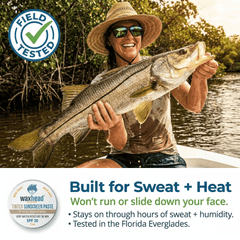 Person holding a large fish on a boat with promotional text about sunscreen.