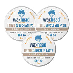 Reef-Safe Tinted Zinc Sunscreen Paste for Face in three containers with SPF 30 label and non-toxic, reef safe information.